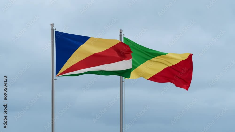 Republic of the Congo flag and Seychelles flag waving together on cloudy sky, endless seamless loop, two country relations concept Republic of the Congo flag and Seychelles flag waving together on cloudy sky, endless seamless loop, two country relations concept
