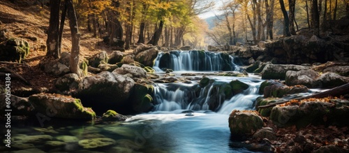 Selective blur in Moncayo natural park during autumn  featuring a waterfall.