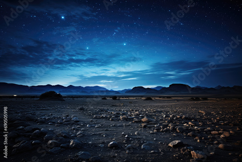 Starry Night Sky Over Vast Desert Landscape