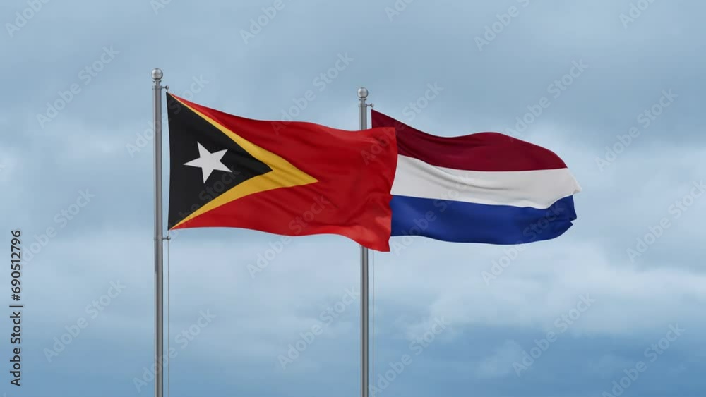 Netherlands flag and Timor flag waving together on cloudy sky, endless seamless loop, two country relations concept Netherlands flag and Timor flag waving together on cloudy sky, endless seamless loop, two country relations concept