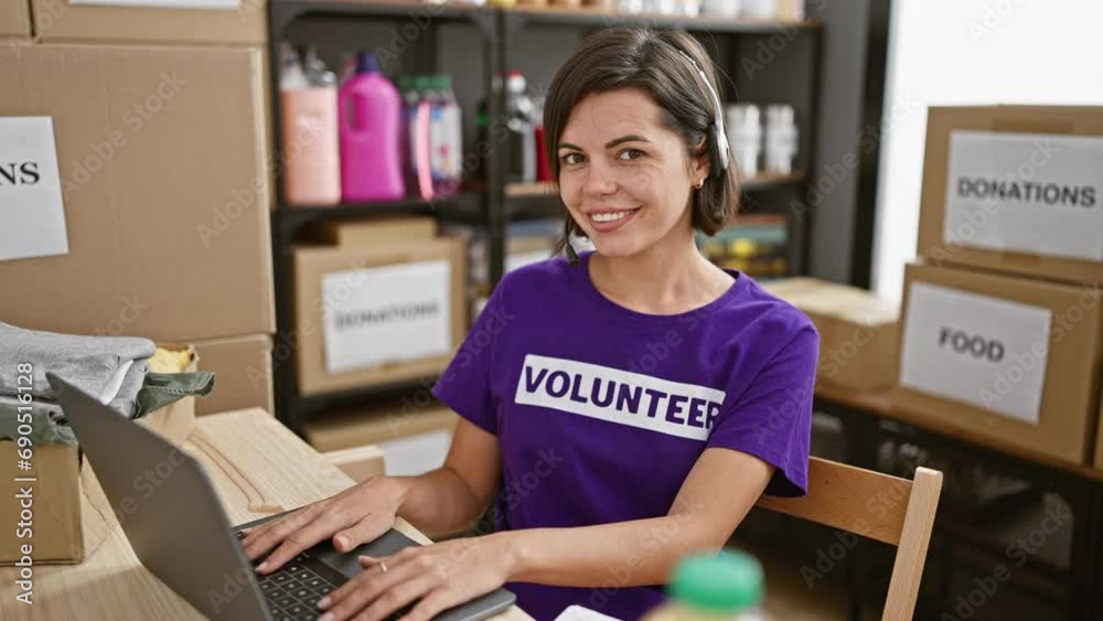 Portrait of a smiling young hispanic woman with short hair, beautiful volunteer working online in call center at charity, laptop, headphones on Portrait of a smiling young hispanic woman with short hair, beautiful volunteer working online in call center at charity, laptop, headphones on
