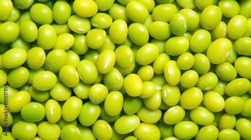  a close up of a bunch of green jelly beans on a white background with space for a text or image. © Jevjenijs