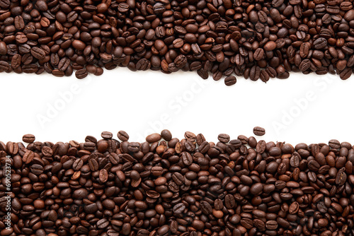Top view of roasted coffee beans texture background on flat lay in horizontal with white free space in center. pattern for design menu drink. coffee beans frame.