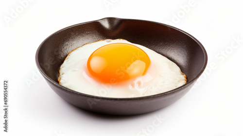 Egg in a pan isolated on white background