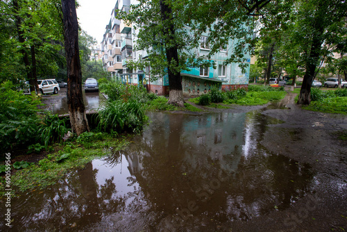Wet streets of a residential area.