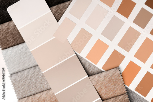 a variety of fabrics with a color palette.New trending PANTONE Peach Fuzz color of 2024 year photo