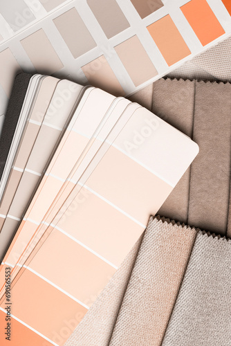 a variety of fabrics with a color palette. New trending PANTONE Peach Fuzz colour of 2024 year