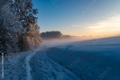 Snowy and beautiful winter landscape in Wolfegg in Upper Swabia © mindscapephotos