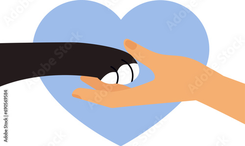 Female hand hold black cat paw. Friendly touch. Side view. Animal and people friendship. Assistance and animal help concept. Heart shape background.