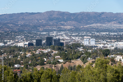 Fototapeta Naklejka Na Ścianę i Meble -  Clear day view of Woodland Hills and Canoga Park in the San Fernando Valley area of Los Angeles, California.  