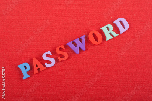 PASSWORD word on red background composed from colorful abc alphabet block wooden letters, copy space for ad text. Learning english concept.