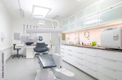 Comfortable Dental Chair Unit with Luxury Dental Chair in Dentist doctor clinic modern medical ward. Health care, medicare industry, heathcare technology concept image
