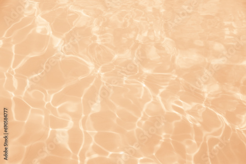 Water surface texture in peach fuzz color