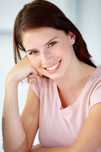 Portrait, woman and smile in home to relax for break, rest and confident personality in Australia. Happy, young and face of beautiful girl in apartment with good mood, pride and positive for optimism