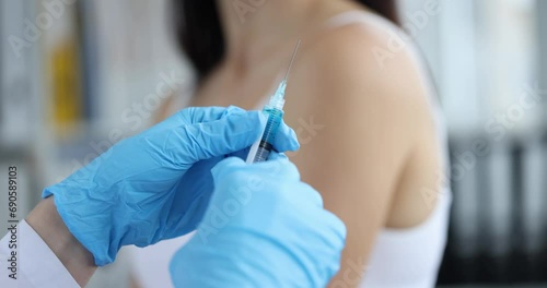 Doctor with syringe and refusal to vaccinate. Immunoprophylaxis and prophylactic vaccinations concept