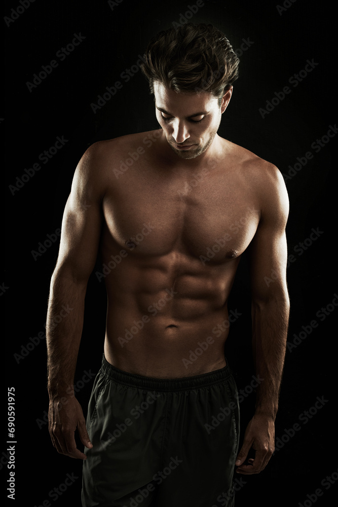Topless, black background or body of man for bodybuilding workout, training or exercise in studio. Fitness model, dark or ripped person with healthy body, shadow or muscle for wellness in Italy