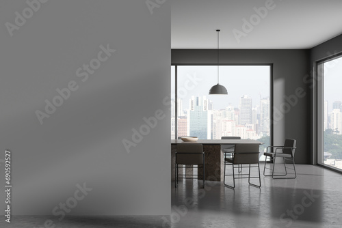 Grey living room interior with eating table and chairs, window. Mock up wall