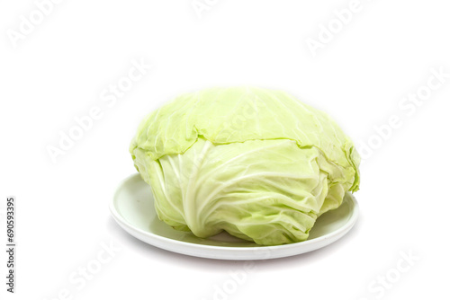 Green cabbage isolated on white background © Filip