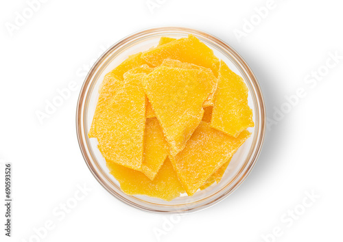 Dried sweet mango slices on white background.Top view.Macro.