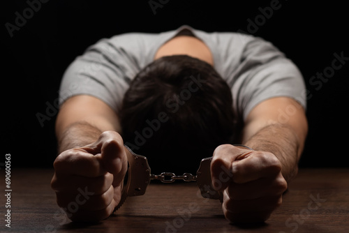 Prisoner male hands criminal with handcuffs © eliosdnepr
