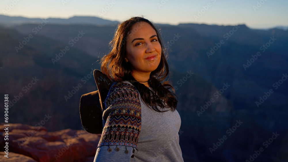 Young pretty woman posing for a photo at the Grand Canyon - travel photography