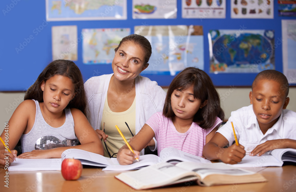 Teacher, portrait and school kids in classroom, writing or learning together for development, studying or knowledge. Woman, children and notebook with support, teaching and education with smile Teacher, portrait and school kids in classroom, writing or learning together for development, studying or knowledge. Woman, children and notebook with support, teaching and education with smile