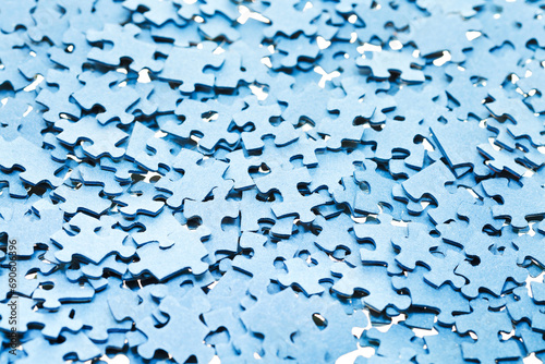 pile of disassembled blue puzzle pieces