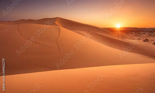 Sunset Over A Desert With Sand Dunes