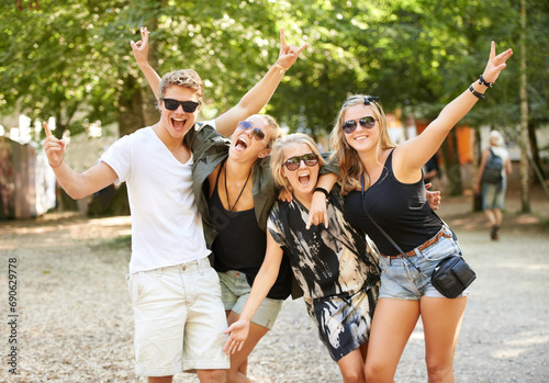 Photos Celebration, hug and friends at a park for festival, concert or happy social gathering