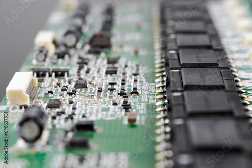 Microcircuit macro photography. Electrical components close-up. Nano technology. Capacitors and microchips.