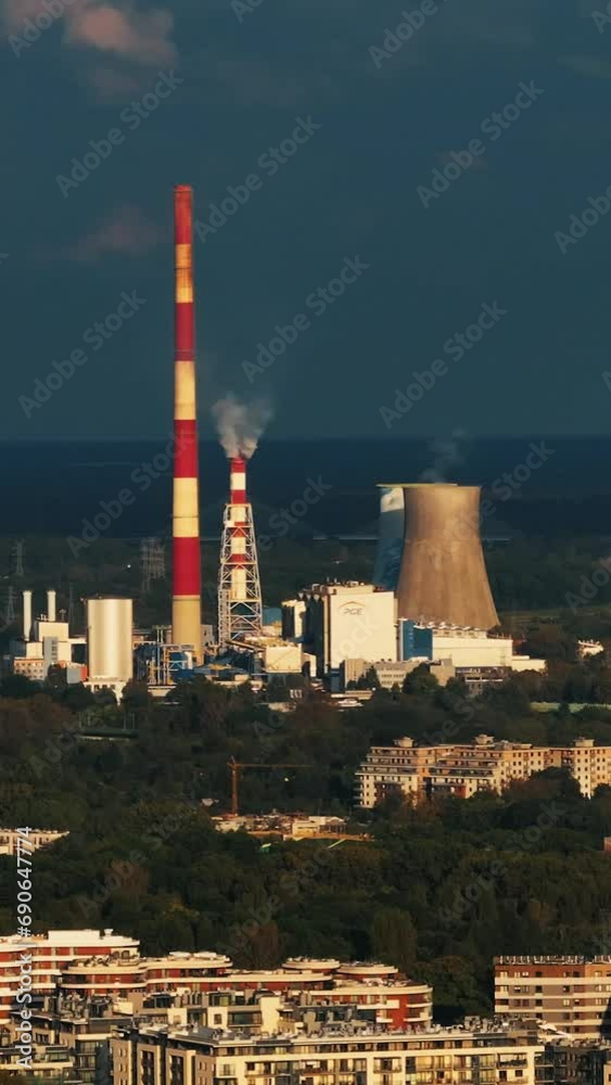 Industrial landscape, the pipes of the thermal power plant. Aerial vertical, vertical video background. Industrial landscape, the pipes of the thermal power plant. Aerial vertical, vertical video background.
