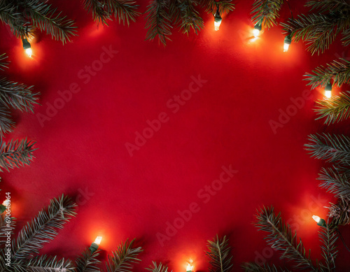 Creative christmas framei on red background. Xmas and New Year holiday, banner, postcard, invitation, celebration. Flat lay, top view