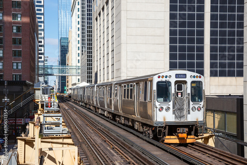Chicago "L" Elevated Metro rail rapid transit train public transport near Harold Washington Library station in Chicago, United States