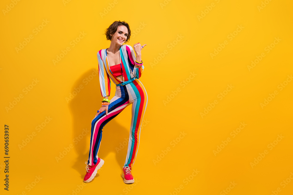 Photo of attractive lady promoter demonstrate sale discounts empty space isolated vivid color background