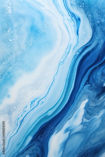 Textured marble swirls in different blue hues background 