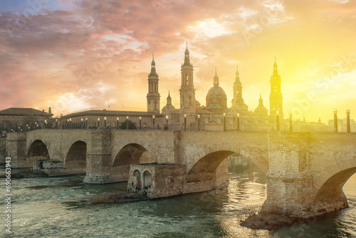 spain zaragoza city architecture and landscapes colorful sunset clouds and light photo