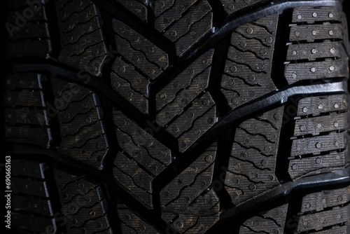 Studless snow tire close-up macro shot landscape photo