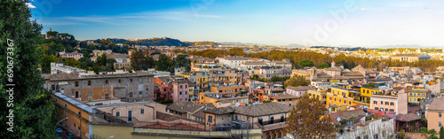 Gorgeous aerial view of the city center in Rome at sunny sunset
