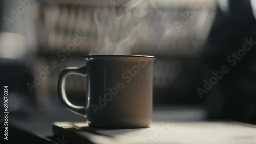 Hot coffee mug in the morning. Delicious drink to start the day. Steaming hot beverage.