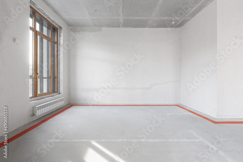 interior of the apartment without decoration in gray colors. rough finish