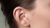 Close-up of the ear. A woman's ear