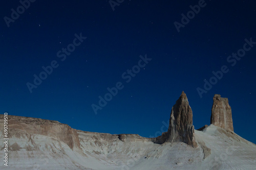 Night scene with the rock pinnacles of Bozzhira valley, Kazakhstan