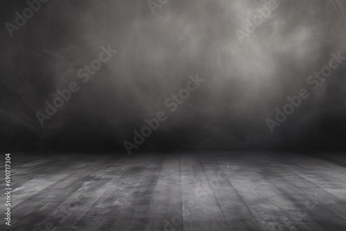 Atmospheric mist enhances the texture of a dark, industrial concrete floor.