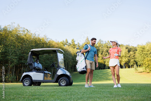 Sunny Day Golfing: Couple on the Green