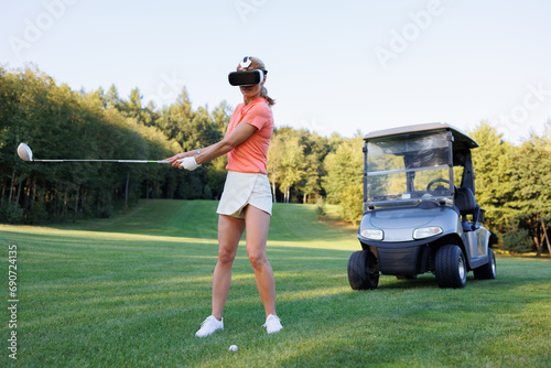 Golf Enthusiast in VR Glasses with Cart on Golf Course