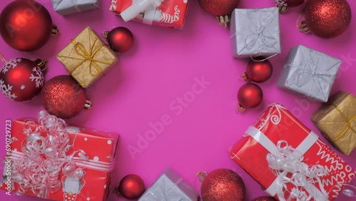 Christmas background. Christmas presents and Christmas balls spinning