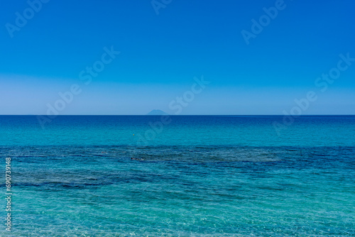 Il mare di Capo Vaticano nella Costa degli Dei in Calabria sullo sfondo Stromboli photo