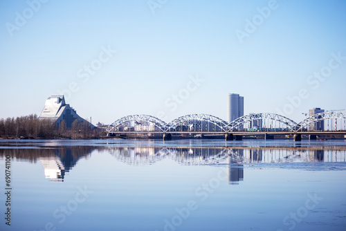  nature view of railway bridge with blue sky on blue river water