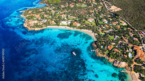 Italy summer holidyas . Sardegna island - stunning Emerald coast (costa smeralda) with most beautiful beaches - Celvia, Capriccioli, Elefante. Aerial drone view