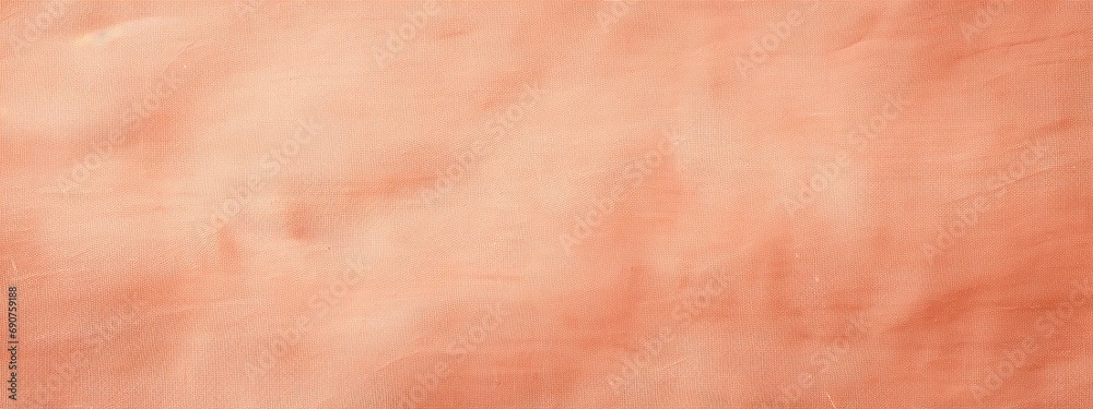 Fototapeta premium The warm copper surface reveals delicate Peach Fuzz 2024 undertones, offering a timeless elegance to any sophisticated design